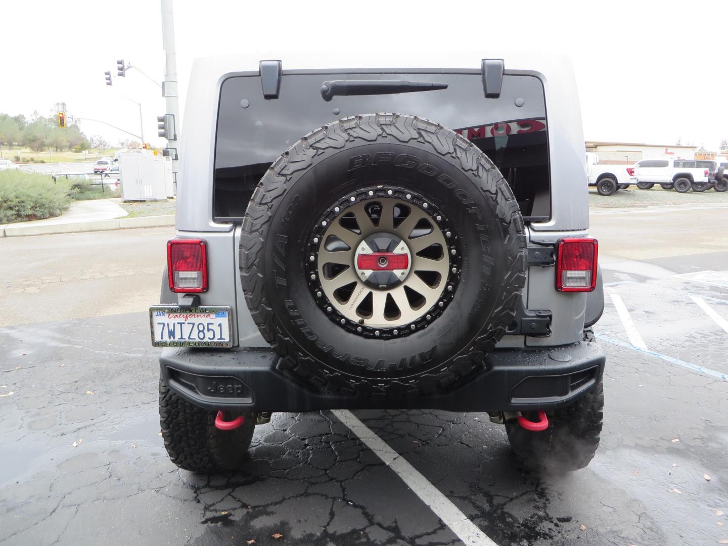 2017 SILVER /BLACK Jeep Wrangler Unlimited Rubicon 4WD (1C4BJWFG3HL) with an 3.6L V6 DOHC 24V FFV engine, automatic transmission, located at 2630 Grass Valley Highway, Auburn, CA, 95603, (530) 508-5100, 38.937893, -121.095482 - Rubicon sitting on a Teraflex suspension system, Falcon shocks, 37" BFG KO2 tires, 17" Hardrock wheels, RC Fender Flares, and AMP steps. - Photo#5